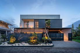 Dark layered massing among landscaping